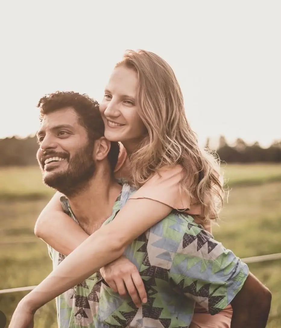 Givol founders Katerina and Nir smiling outdoors